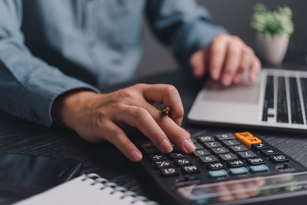 Someone using a calculator