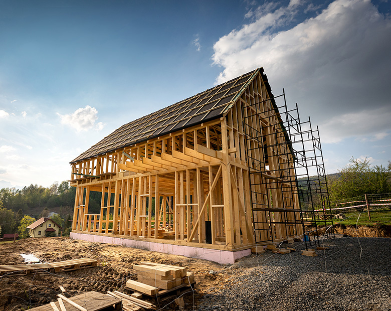 Wooden house frame - People & Workforce Protection