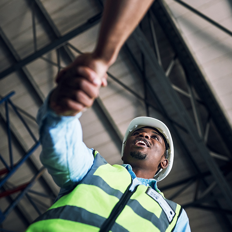 Person shaking hands - People & Workforce Protection